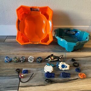 Beyblades galore! Five regular, one mini, five launchers, two stadiums